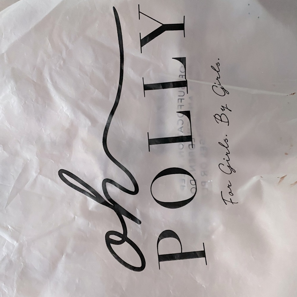 Never worn, Brand new. Fits small and medium.